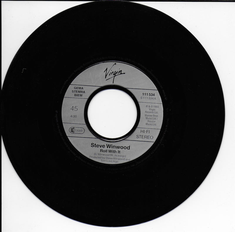 Steve Winwood - Roll with it