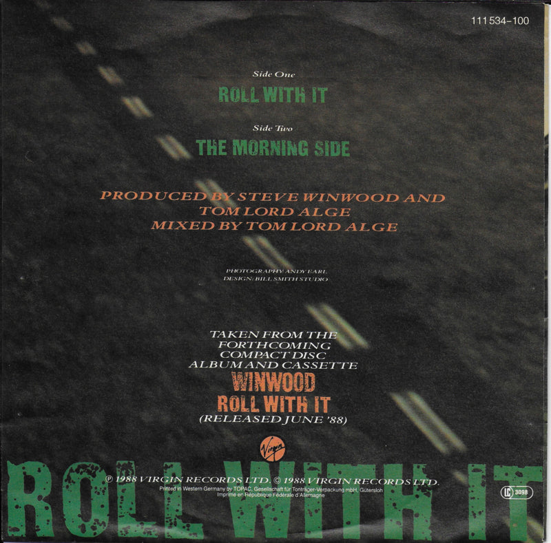 Steve Winwood - Roll with it